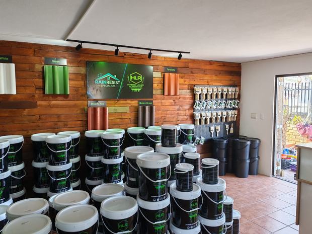 20 litre buckets of Hybrid Liquid Rubber stacked in store ready for collection